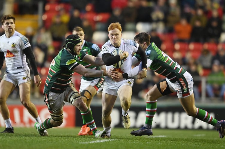 Exeter Chiefs winger Ben Hammersley looks to find a way past Leicester Tigers duo Harry Wells and Handre Pollard during their Gallagher Premiership encounter