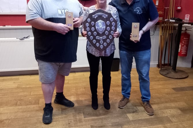 Winners James Chudleigh and Barrie Evans with their trophies following a successful charity fundraising night for the British Heart Foundation at the Old School in Pelynt