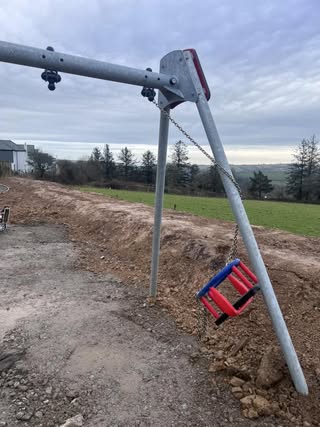 A broken swing at the new play park at Farriers Way in Widegates 