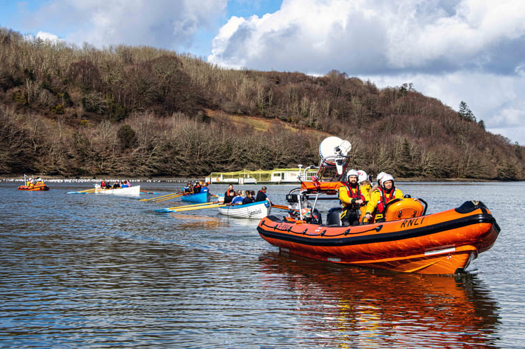 The flotilla of gig rowing boats were escorted by the Looe RNLI Atlantic 85 and D Class inshore lifeboats. (Picture: RNLI Looe)